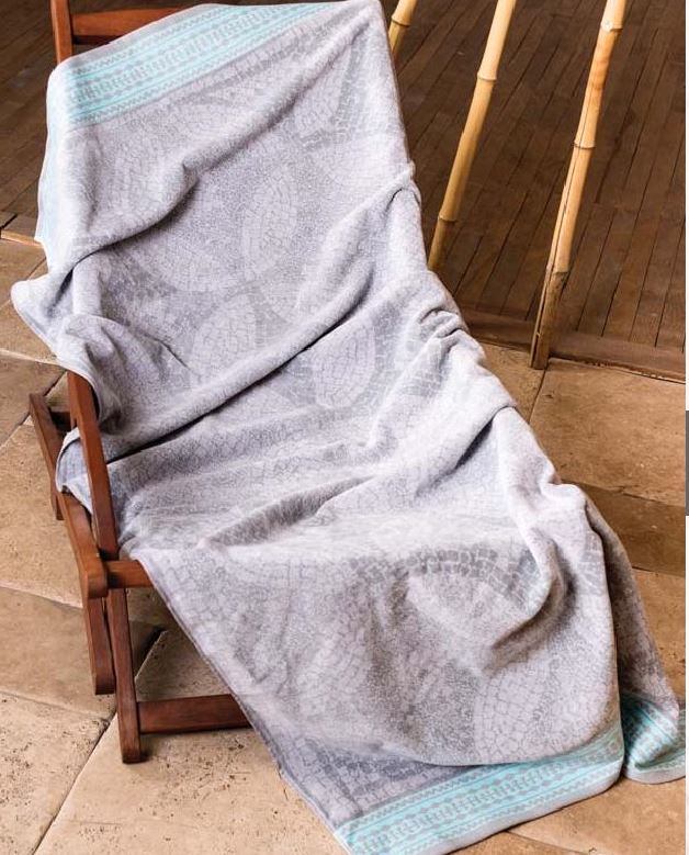 gray cotton towels on chair